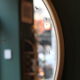 Large vintage circular mirror, plastic frame.