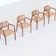 Niels Otto Moller model 66 armchairs teak and paper cord Denmark 1974