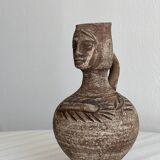 Decorative vase in raw terracotta
