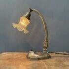 French art nouveau table lamp with transparent glass shade