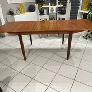 Large extendable Scandinavian table in vintage teak from the 1970s.