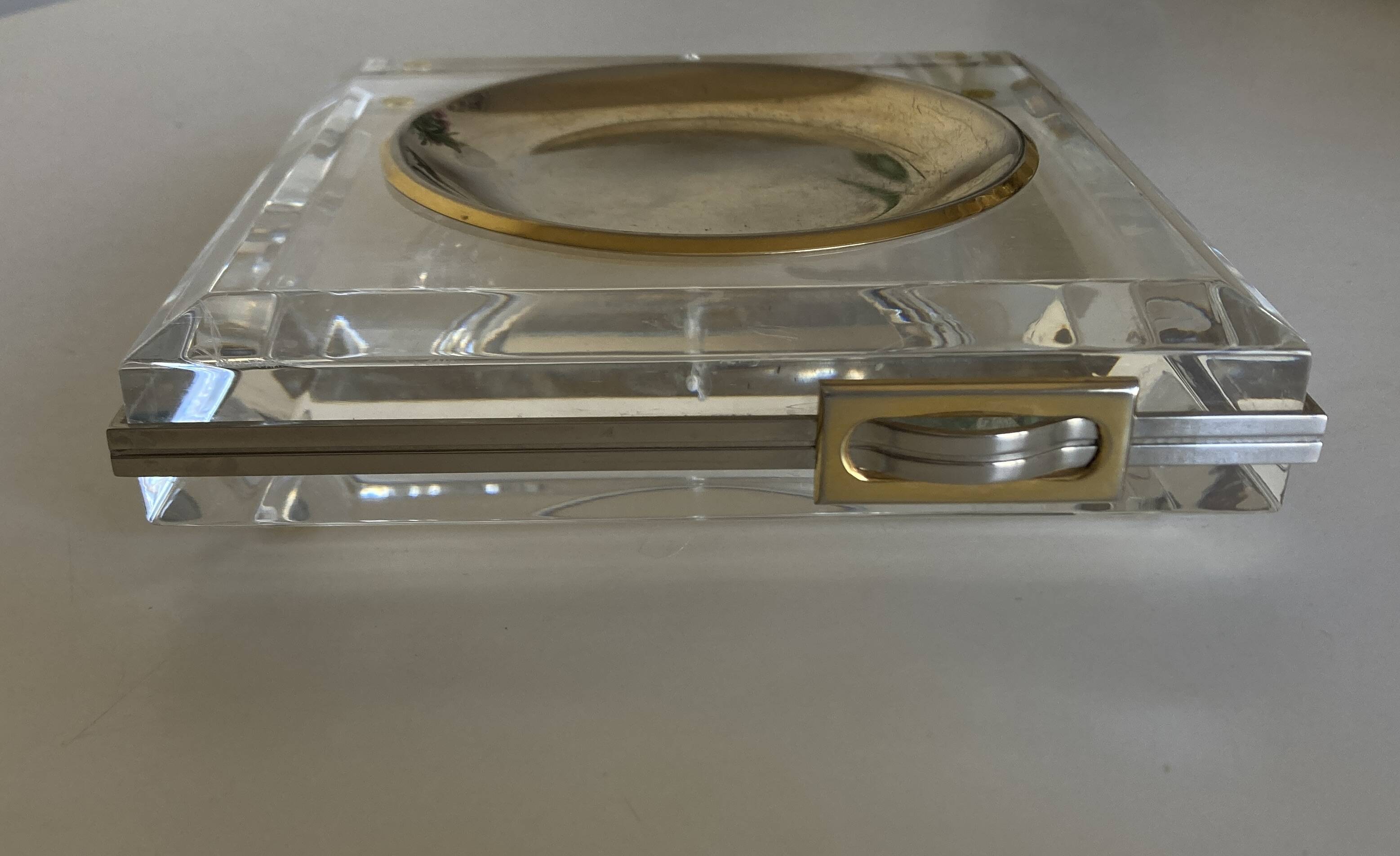 Plexiglas pocket emptier with brass and nickel silver surround, 1975, in the style of Pergay