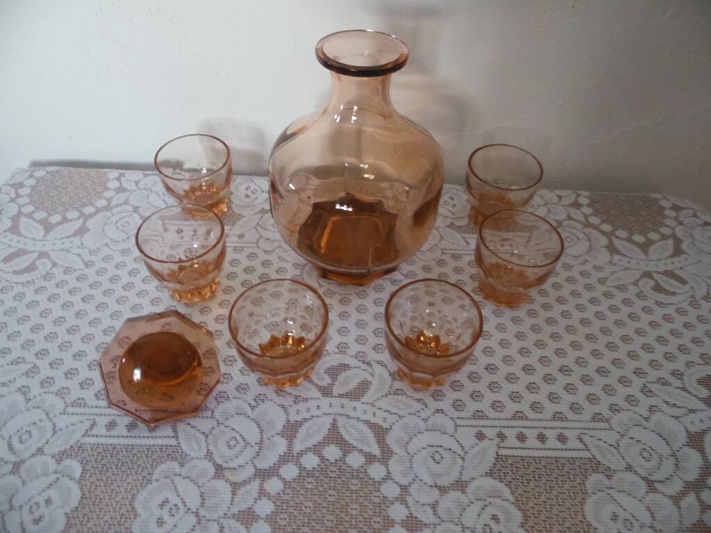Pink glass liqueur carafe and 6 matching glasses