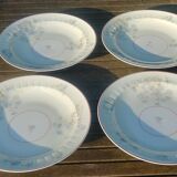 Set of four hollow Limoges porcelain plates signed Robert Haviland & Le Tanneur