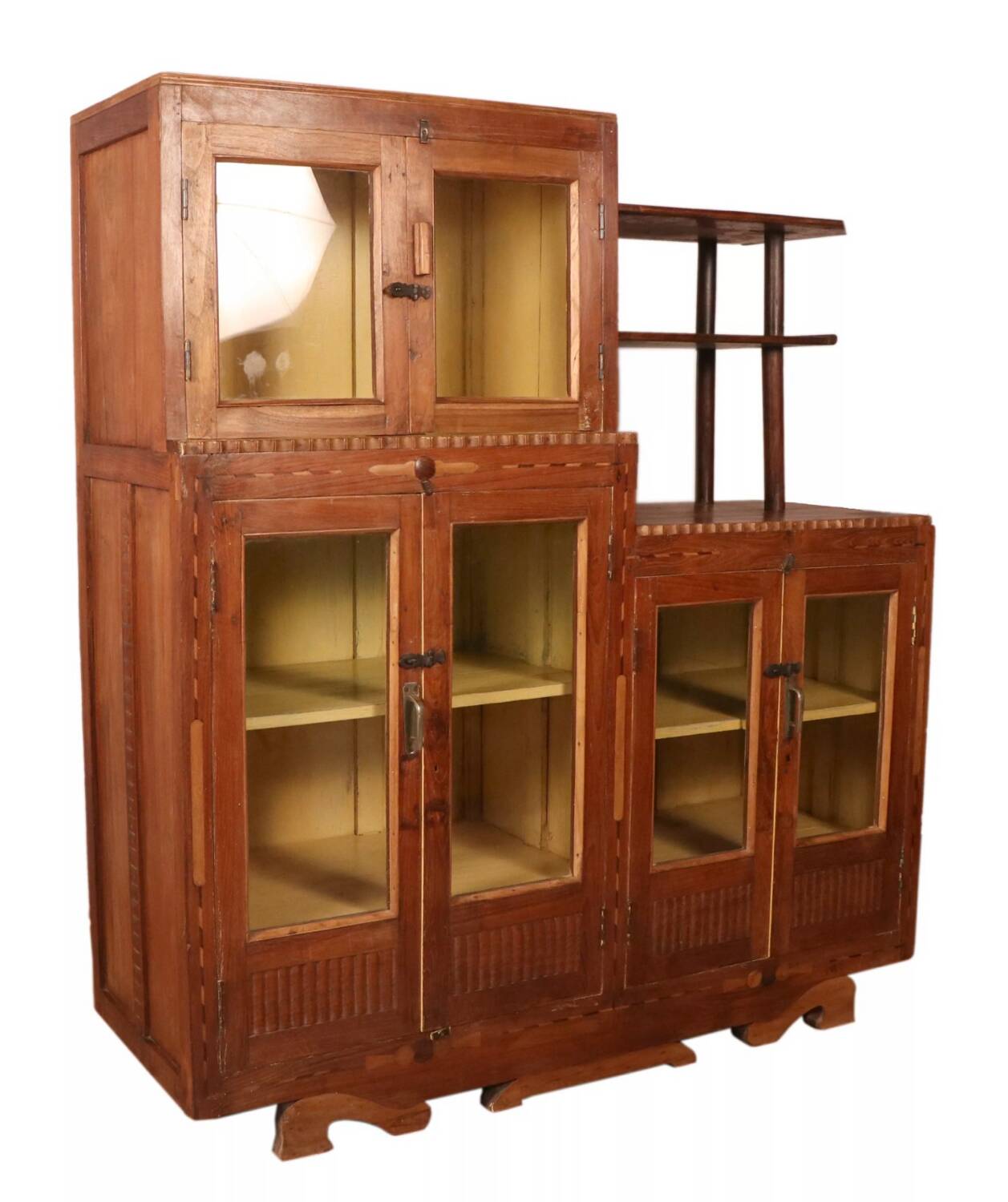 Antique Art Deco display cabinet in Burmese teak with original yellow patina interior.