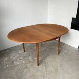 Scandinavian round teak table with extension