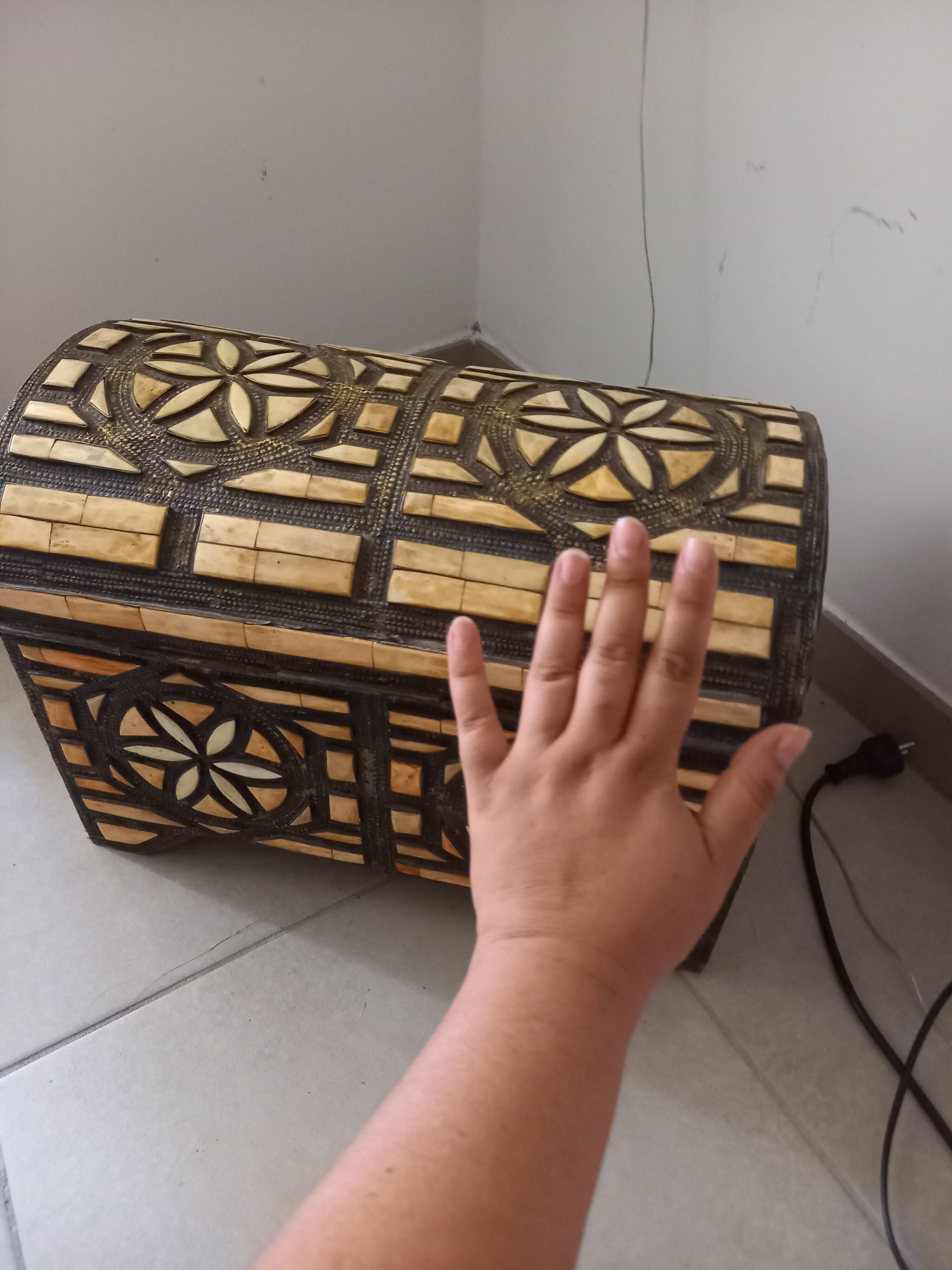 Handcrafted chest made of brass and camel bone.