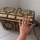 Handcrafted chest made of brass and camel bone.