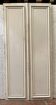 Front of cupboard with double molded doors 20th century Passage doors