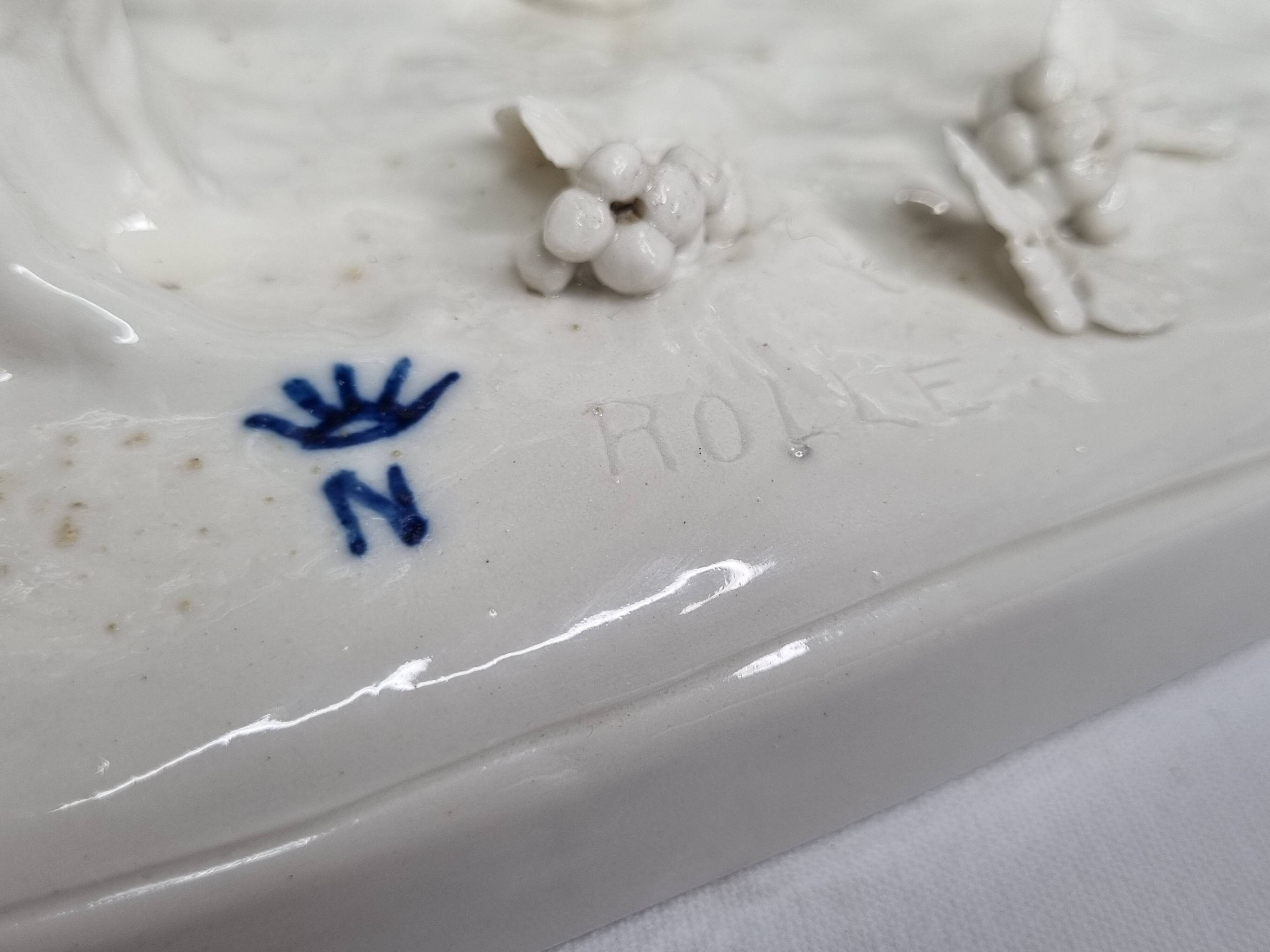 Saxon porcelain group, two fighting goats, signed Röhle, 1900