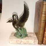 Art Deco bookends with metal swans, double patina and marble base.