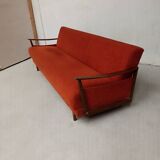 Vintage orange convertible sofa