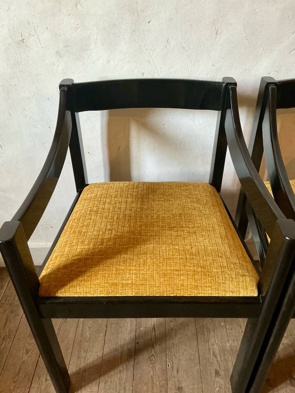 Four designer armchairs