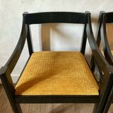 Four designer armchairs