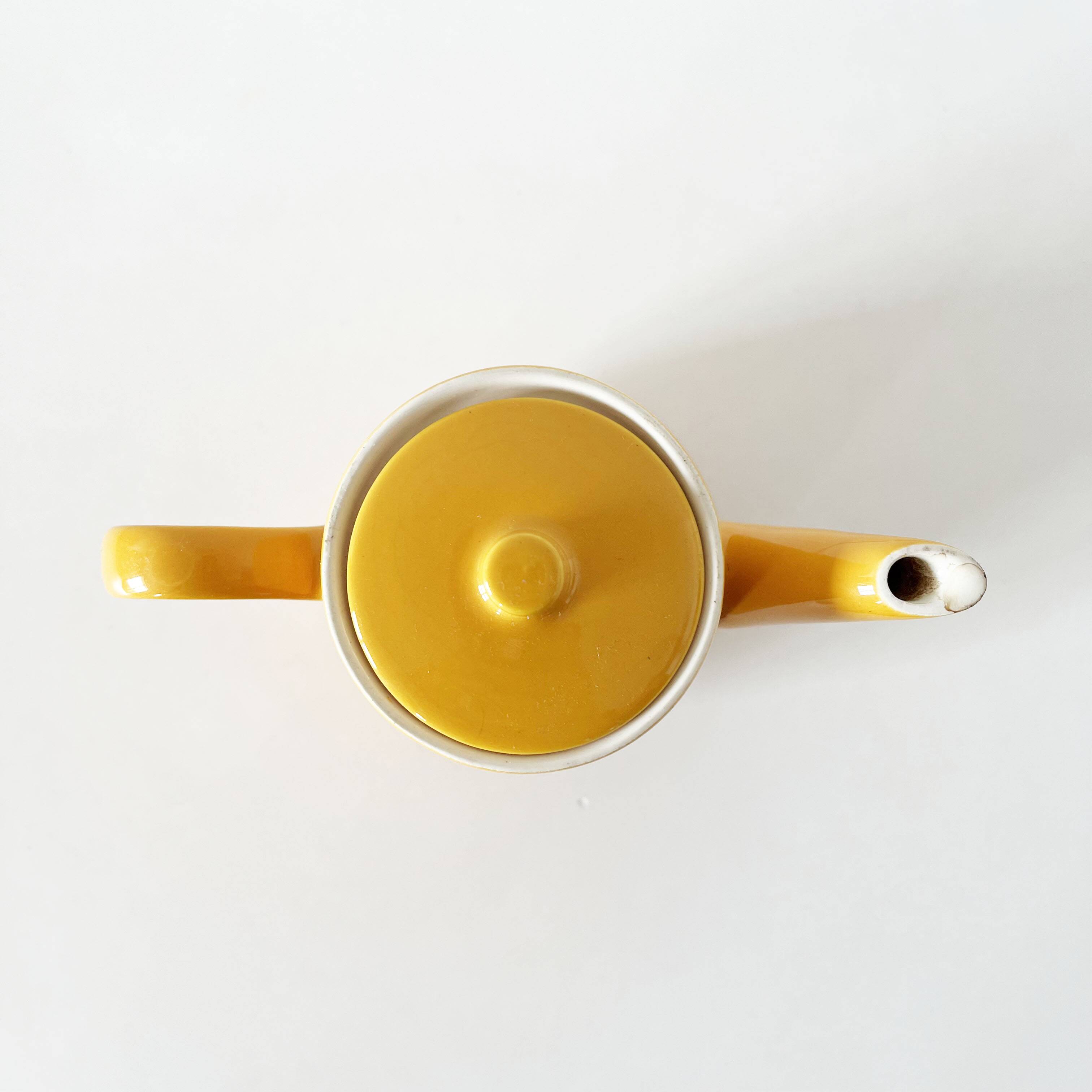 Old yellow ceramic coffee or teapot 1960