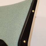 Vintage armchair from the 1960s in black wood and fabric.