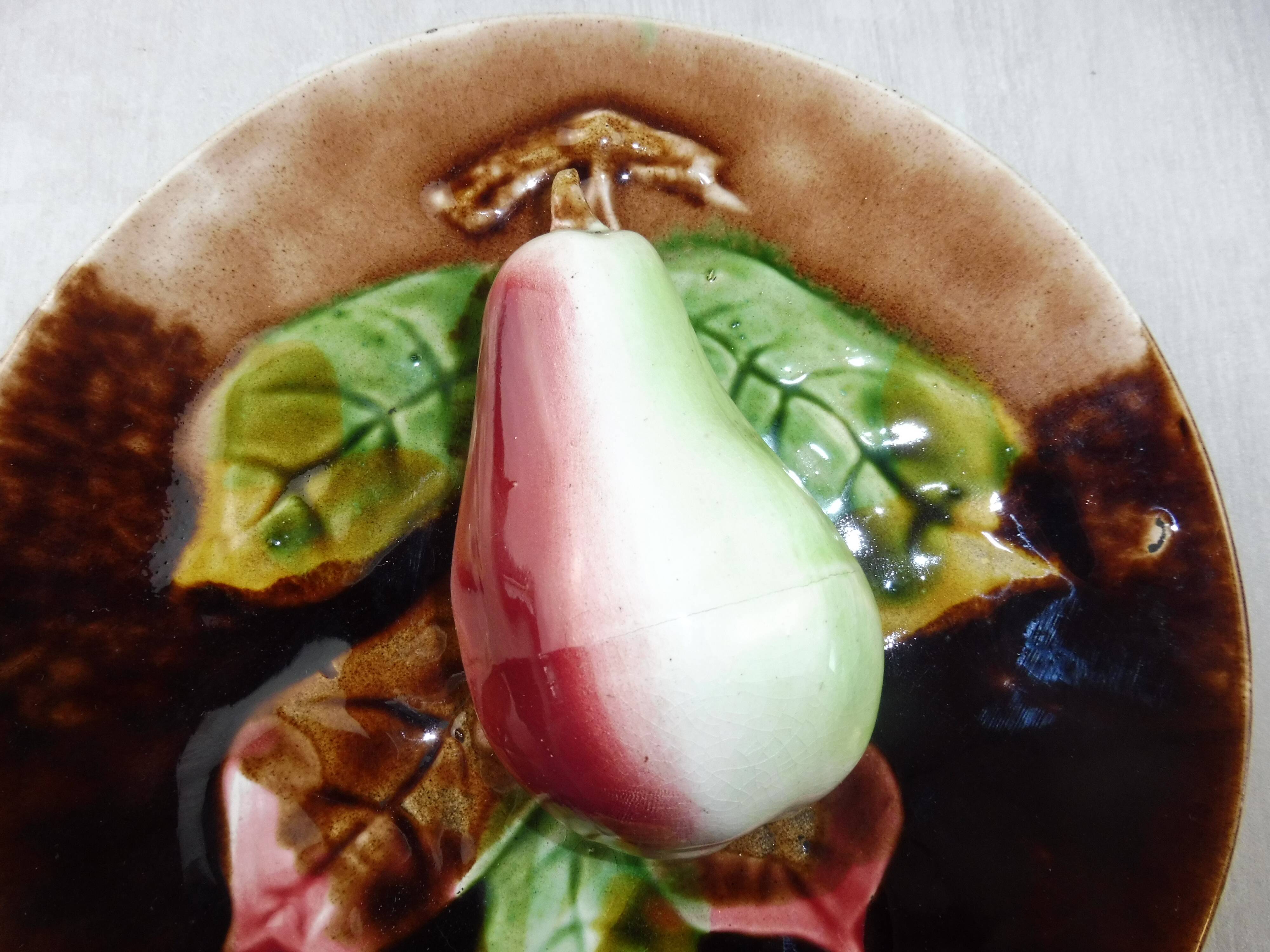 Old plate in dabbling, pear in relief