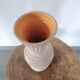Clear natural terracotta vase decorated ethnic motifs