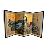Ancient Chinese screen decorated with peacocks and flowers on gold leaf