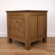 Oak side cabinet with carved motifs