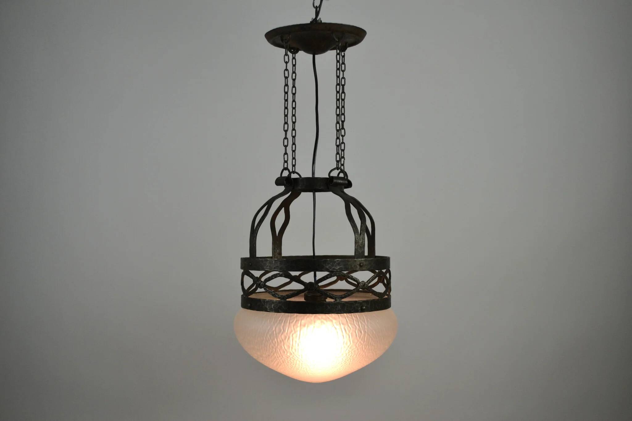 Ceiling lamp, hand-forged hammered iron with glass shade, early 20th century, Sweden