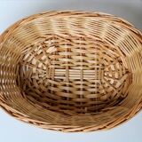 Braided rattan pan-maker bread basket covered with linen fabric