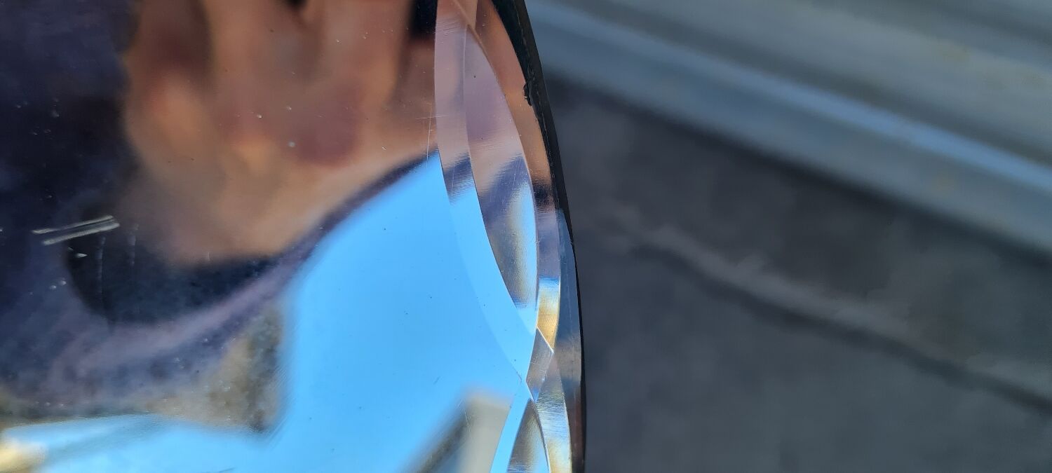 Beveled round mirror