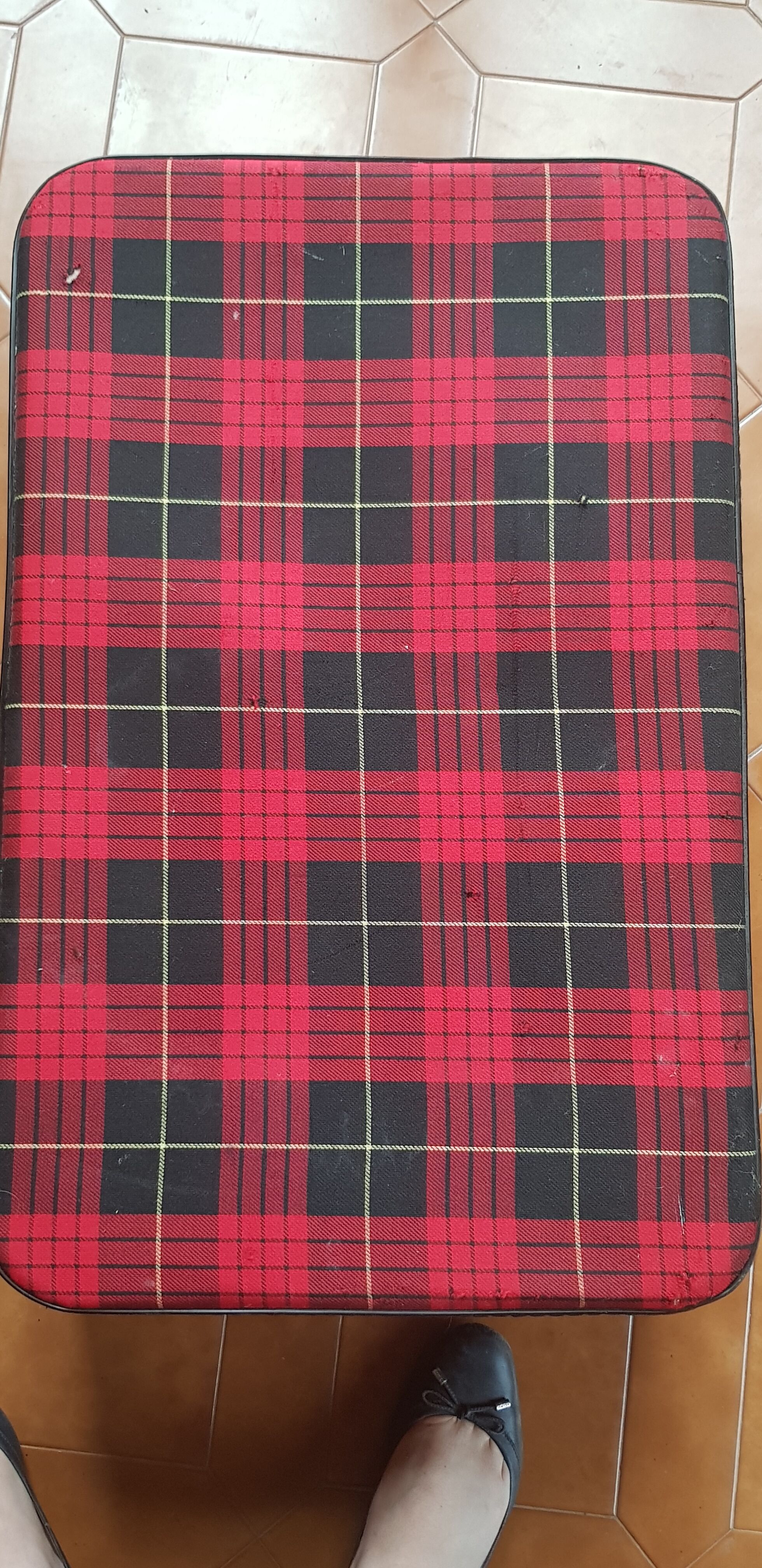 Vintage suitcase covered with scottish fabrics