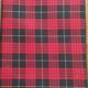 Vintage suitcase covered with scottish fabrics