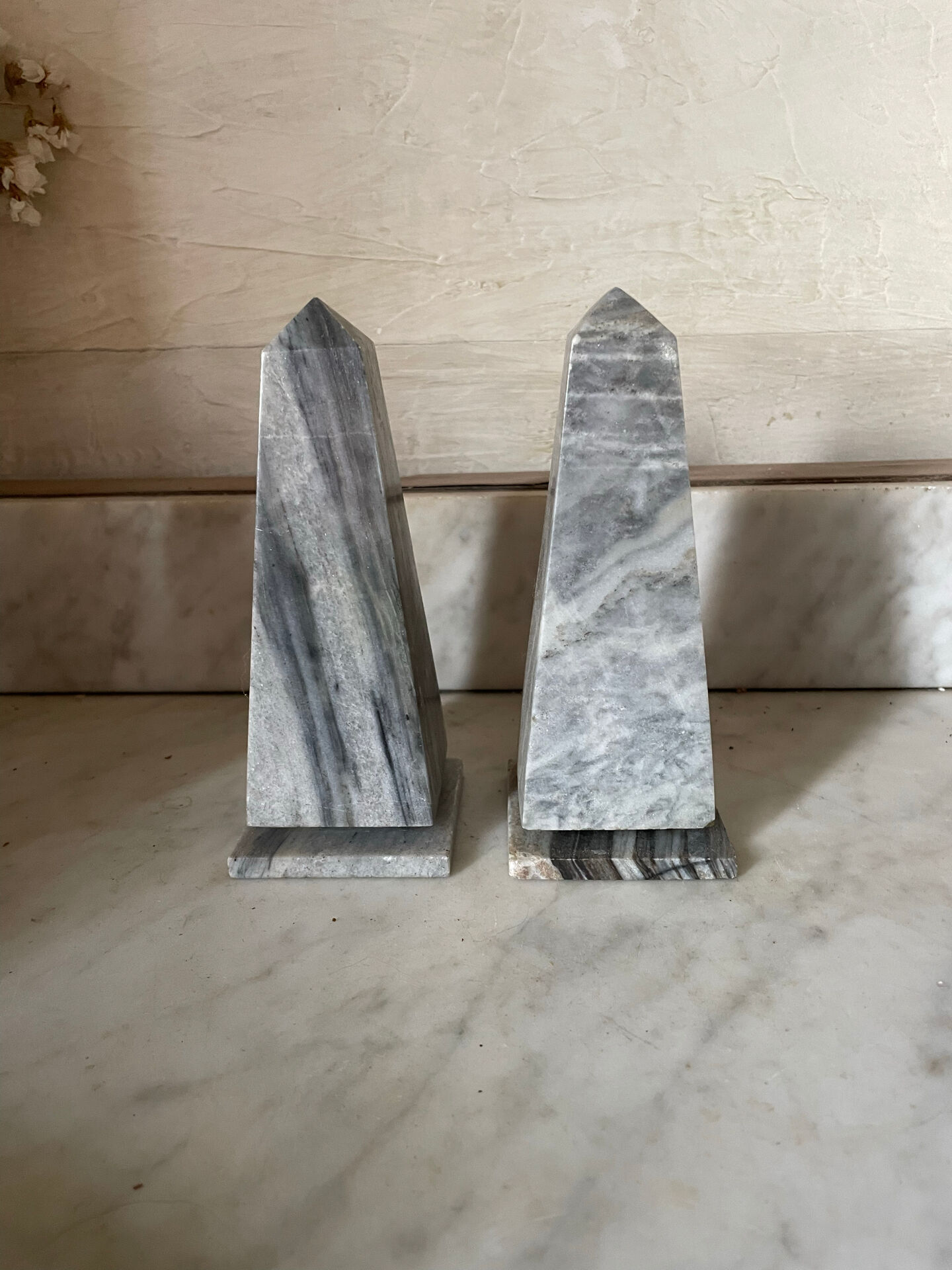 pair of obelisk bookends in marble Art Deco style