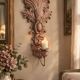 Incredible patinated wall candle holder