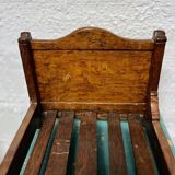 Lit de poupée ancien en bois vernis