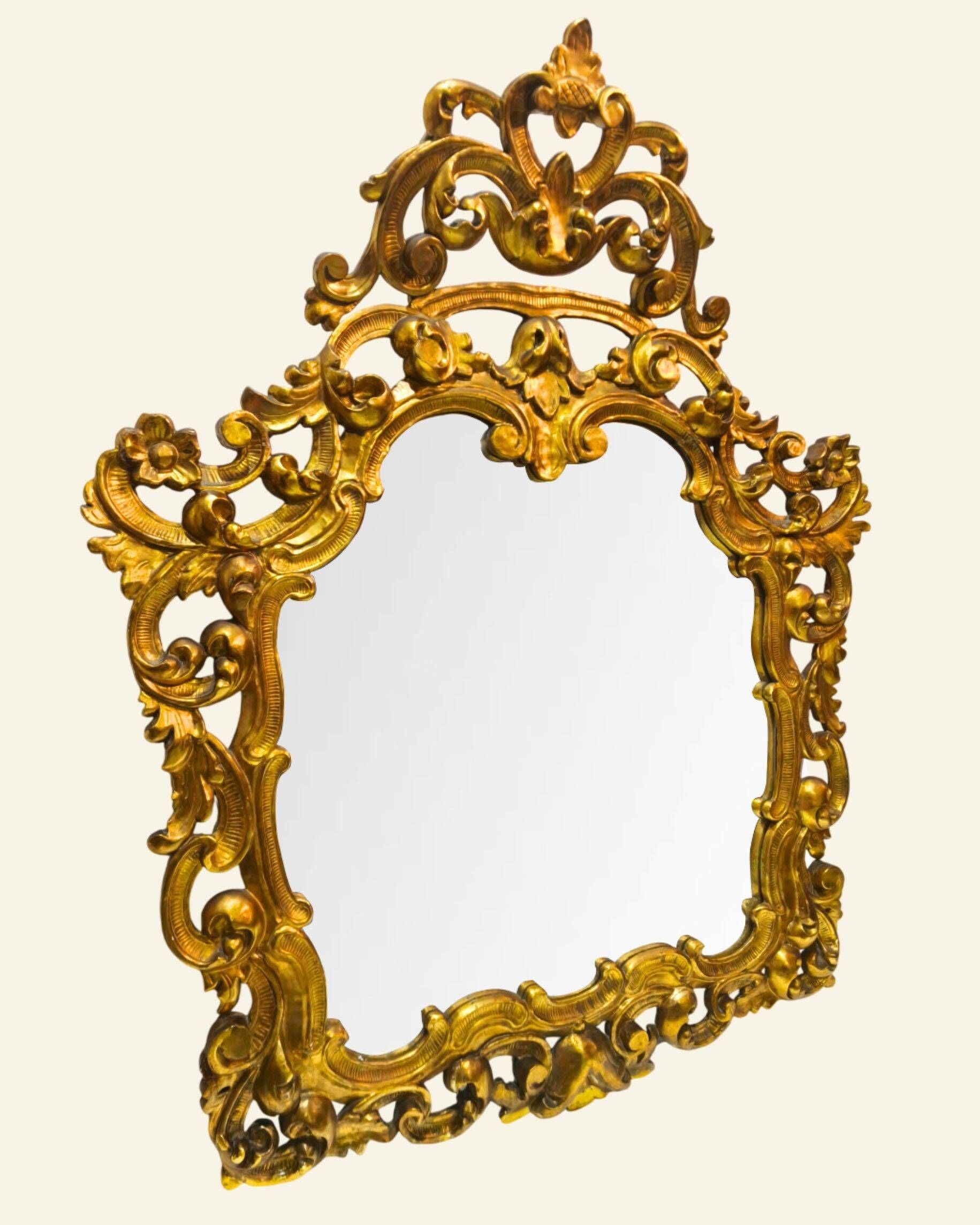 Antique wall mirror in carved and gilded wood, baroque style, 140 × 115 cm