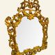 Antique wall mirror in carved and gilded wood, baroque style, 140 × 115 cm