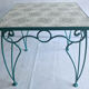 Table en fer forgé et carreau de ciment