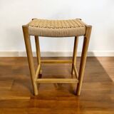 Solid wood stool with hand-woven seat