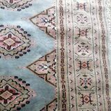 Old oriental carpet made hands. Signature. (175 x 125 )