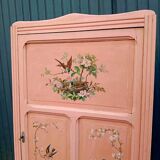 Old pink Parisian cabinet with painted decor
