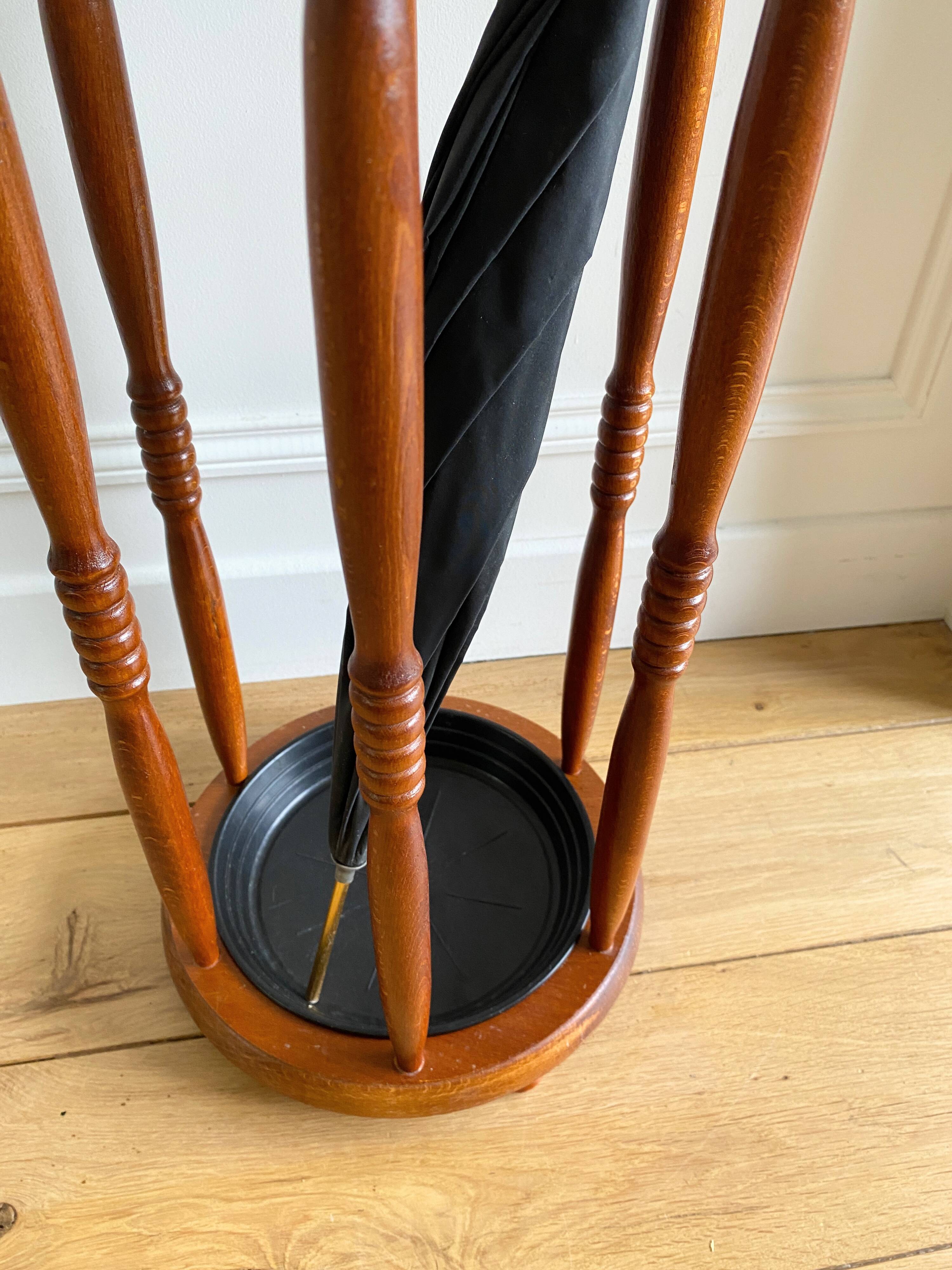 Vintage round wooden umbrella stand