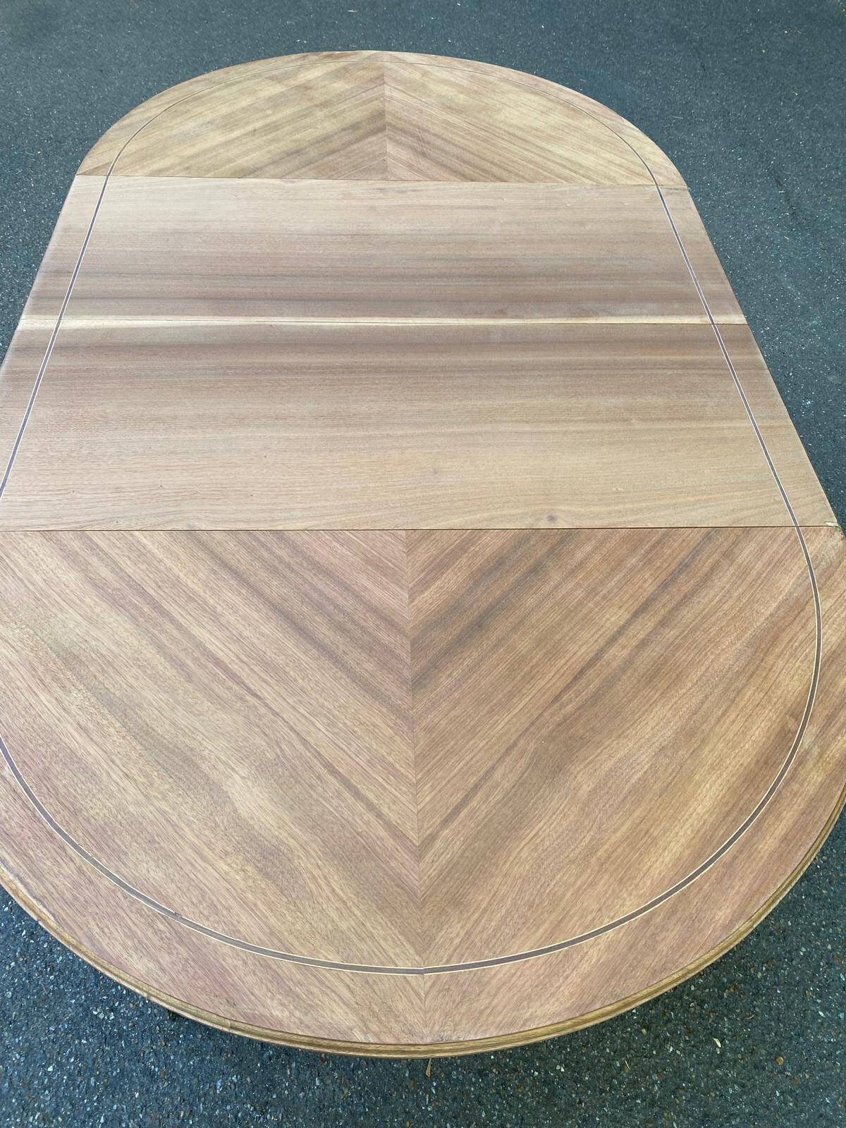 Round extendable dining table stripped in cherry wood with Louis XVI marquetry 1