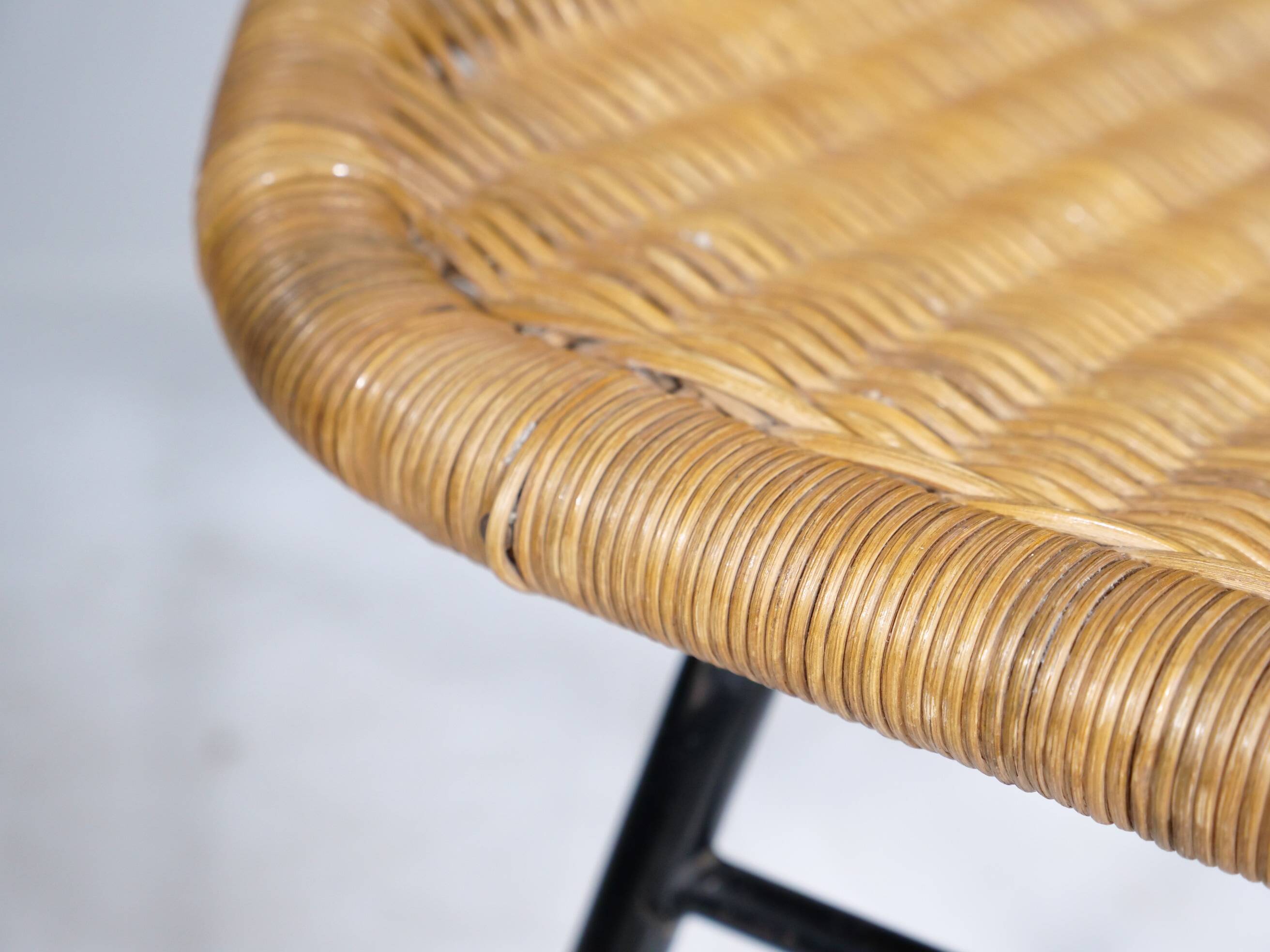 Woven rattan armchair from the 1960s