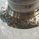 Crystal and solid silver shaker, neck brace and master's mark.
