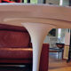 Knoll International table circa 1960, melamine wood top, white lacquered cast iron legs