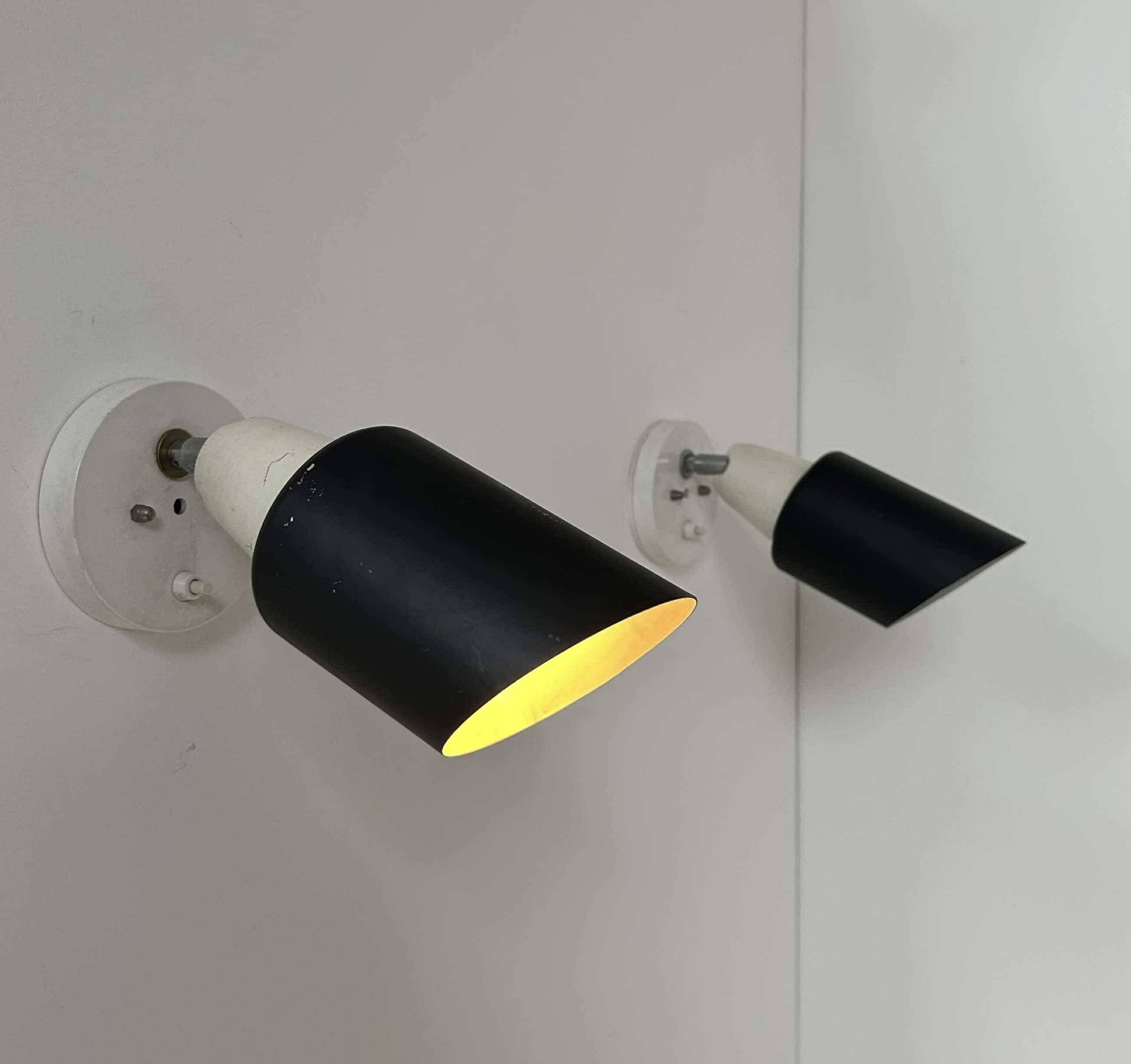 Pair of vintage adjustable wall lights, black and white, Raak Netherlands 1970