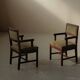 Pair of modernist armchairs in solid oak, France, circa 1940.