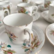 12 ironstone coffee cups with polychrome floral decoration, KG Lunéville