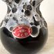 Vintage black and white Savoyard enamel vase