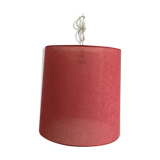 Suspension in fabric stretched over celluloid, strawberry red crushed
