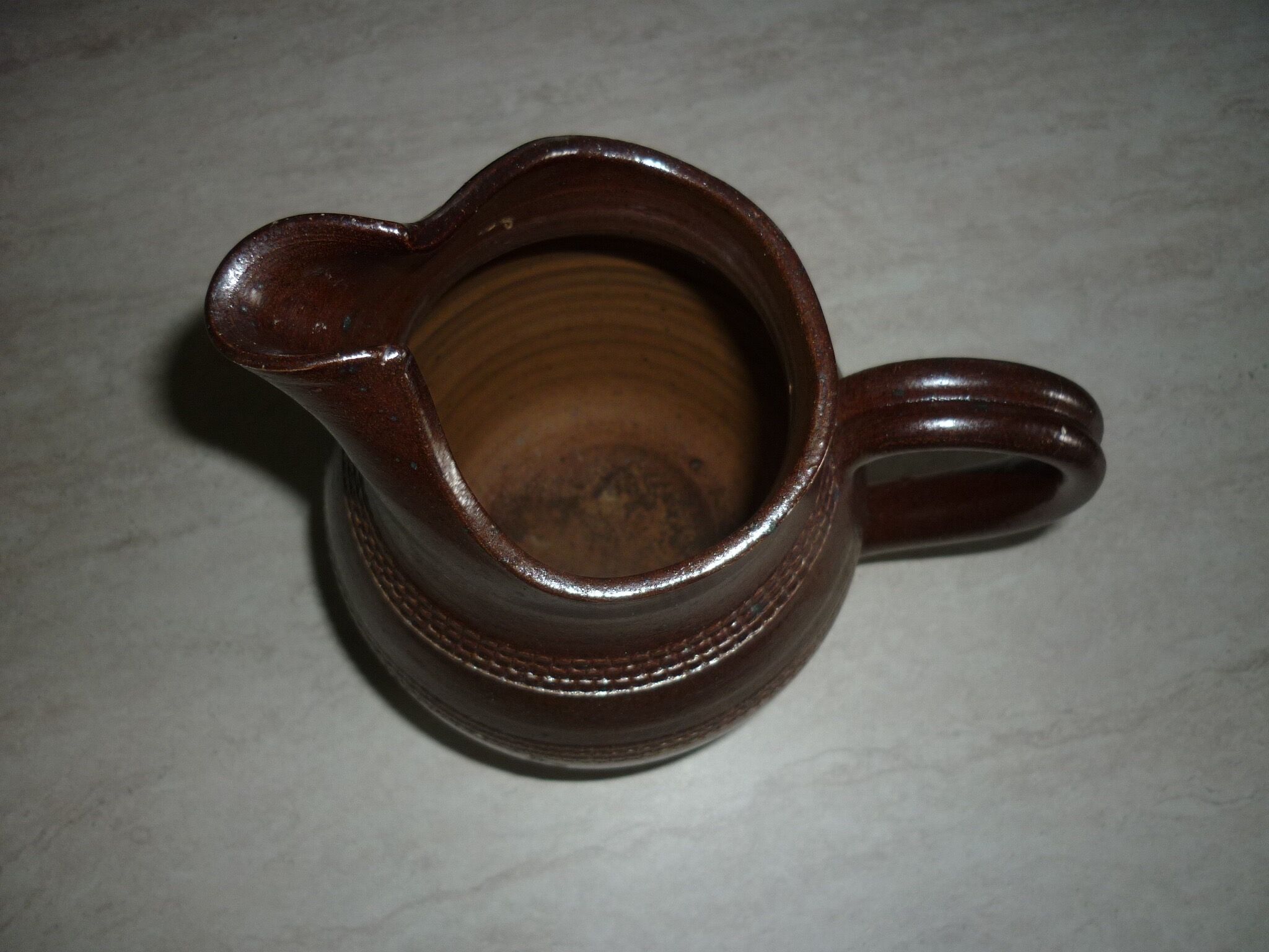Dark brown Berry sandstone pitcher