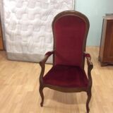 2 red voltaire armchairs